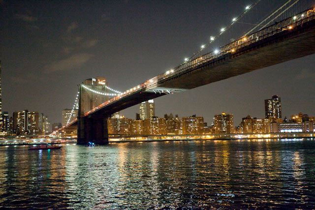 The Brooklyn Bridge, suffering another indignity after a crane struck its belly last May